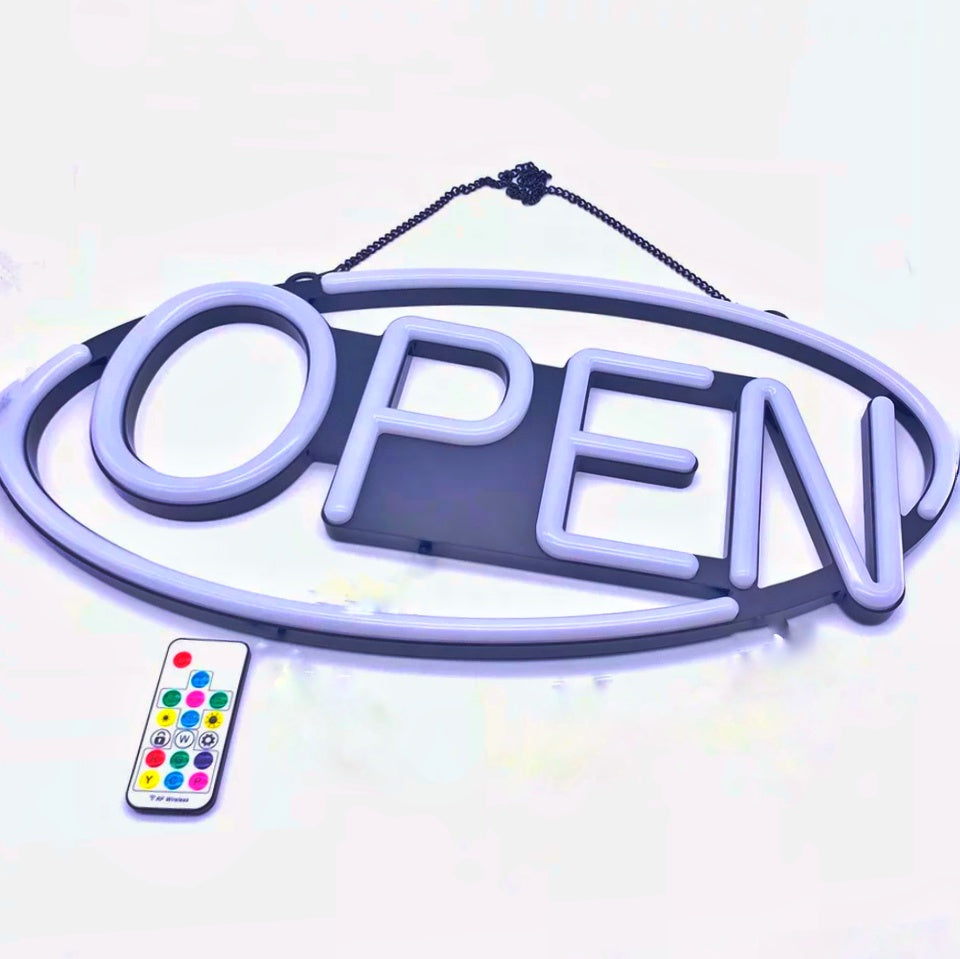 Multi coloured rainbow open sign